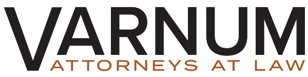 Varnum: Attorneys at Law Logo